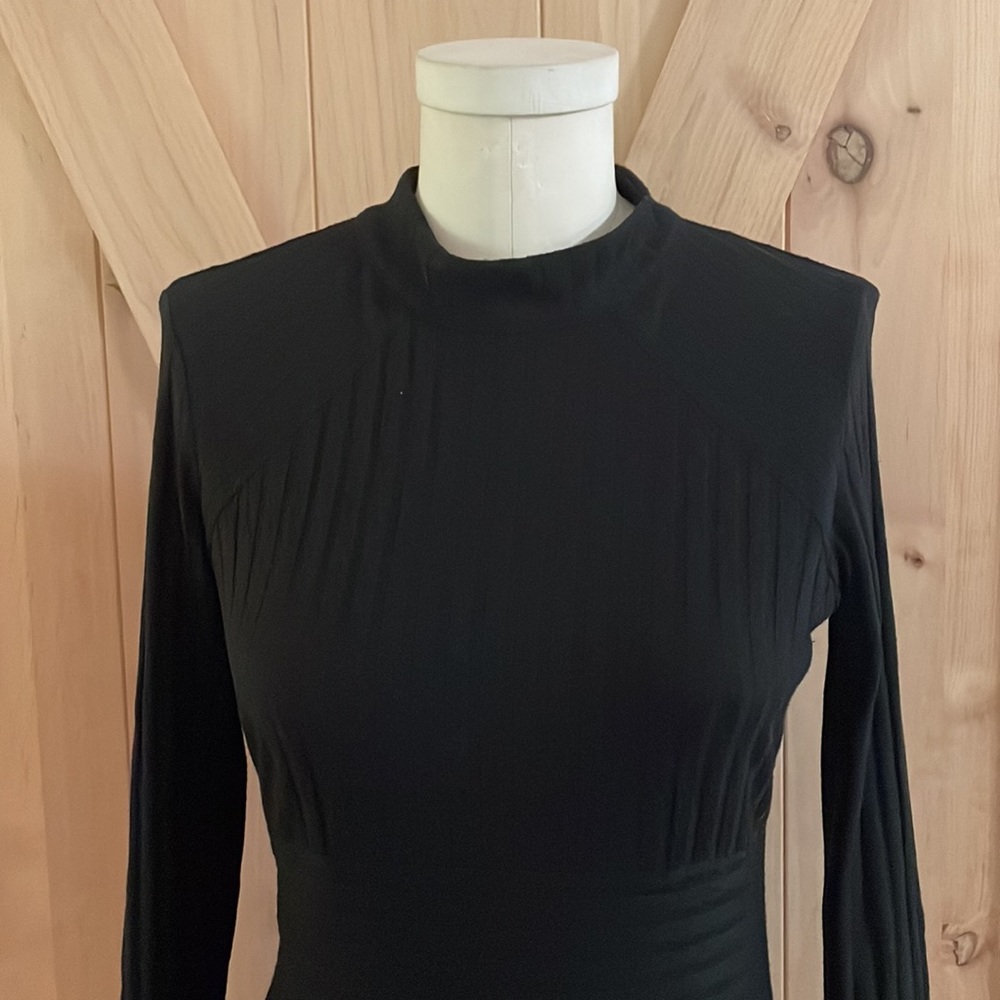 Long sleeve open back bebe top
